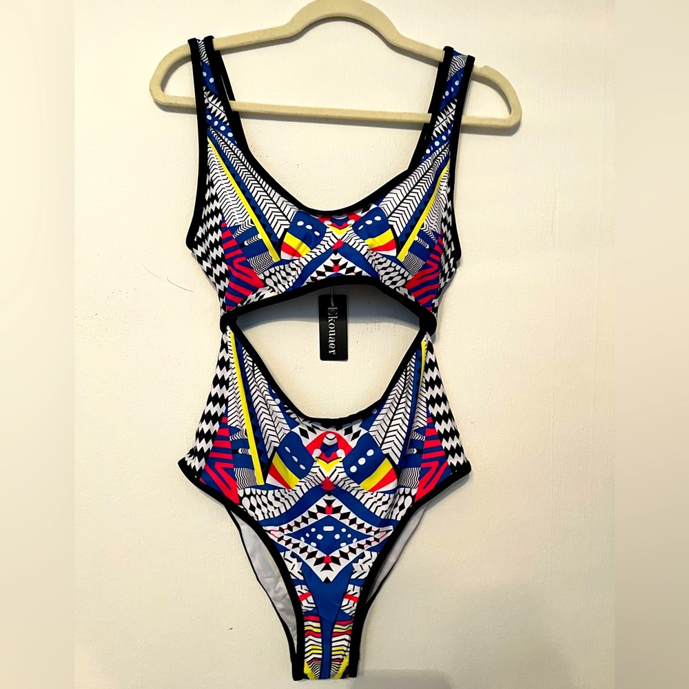 Brand new one piece bathing suit. Vibrant pattern! Size large!